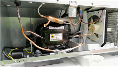 Figure 1: Refrigerator compressor under test